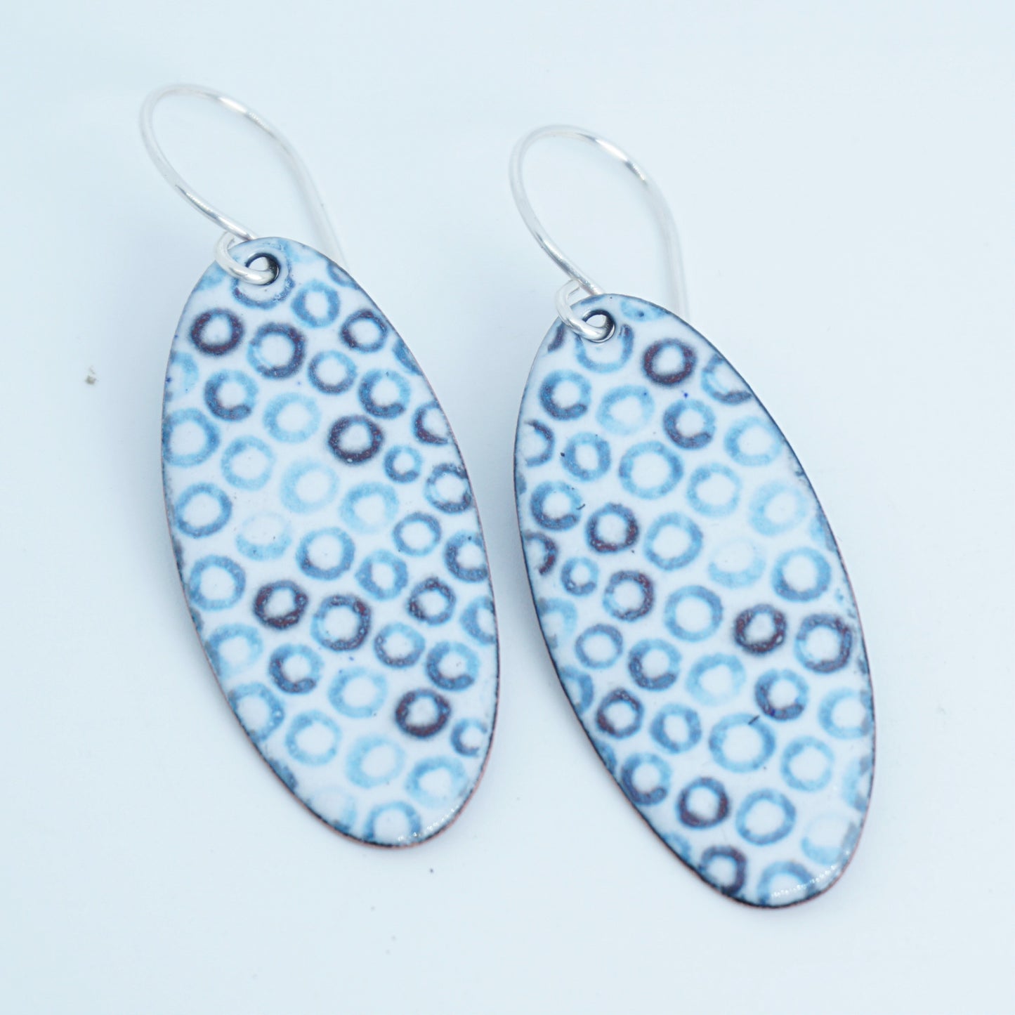 White Enamel Oval Earrings with Blue Bubbles