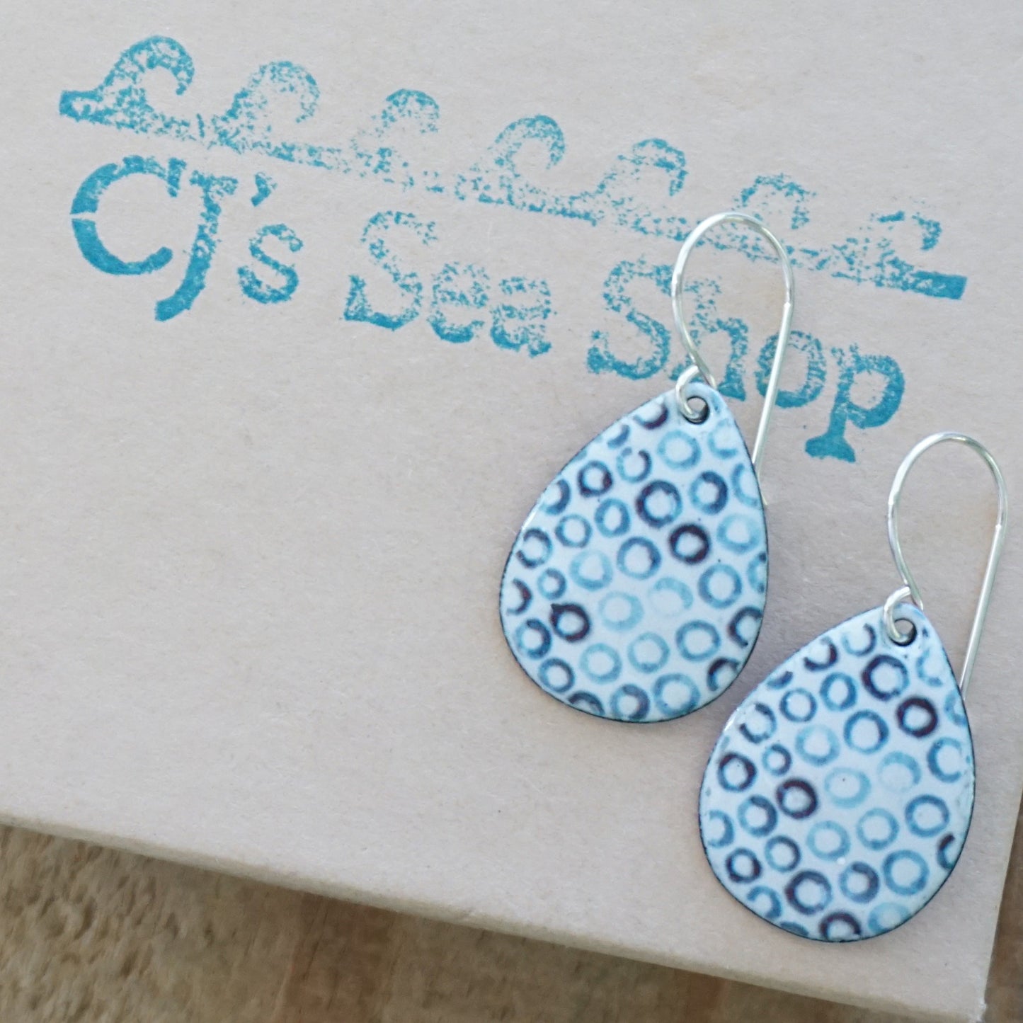 White Enamel Teardrop Earrings with Blue Bubbles