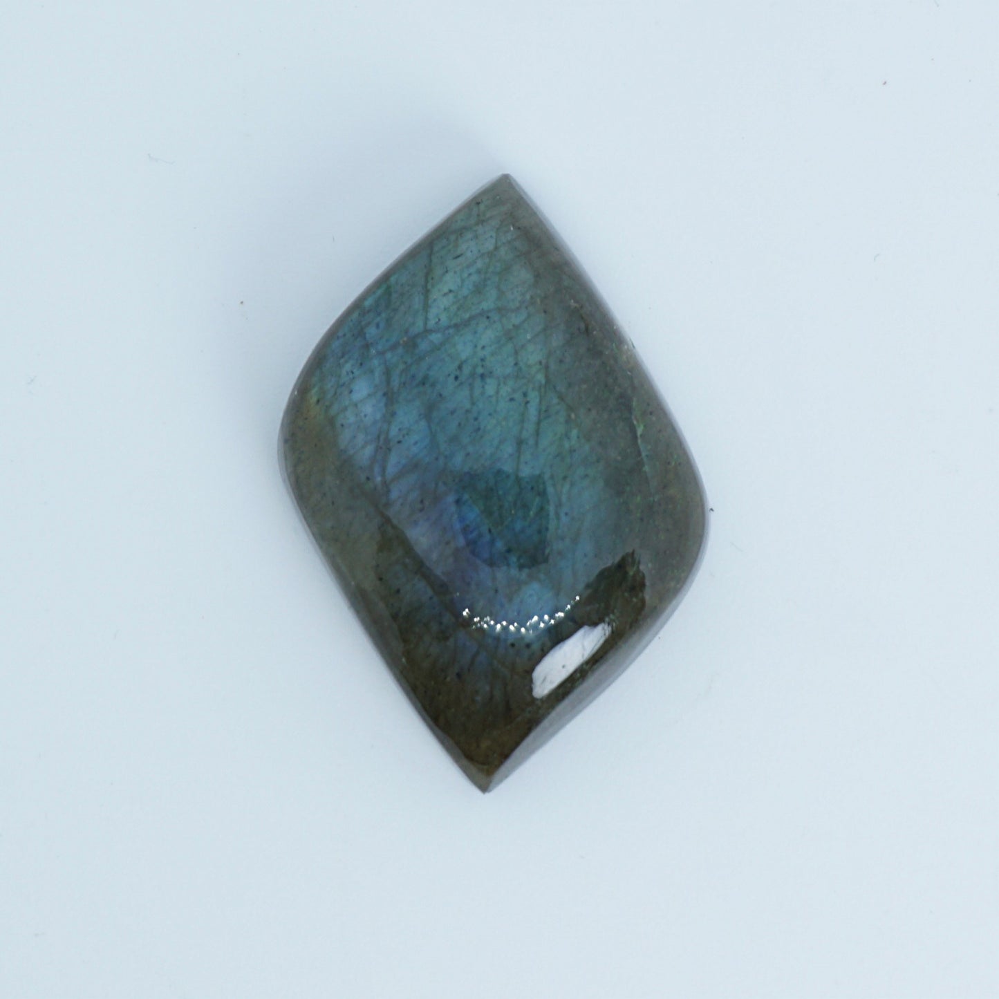 Labradorite stone on a white background