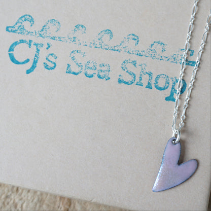 pink Heart-shaped pendant necklace on a gift box