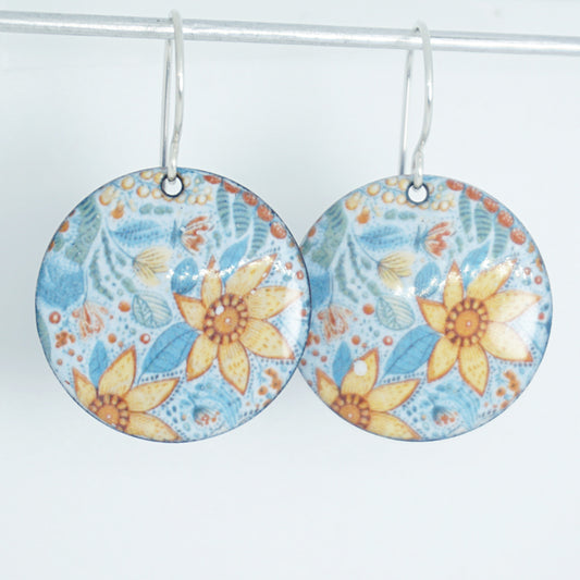 Floral patterned earrings on a white background