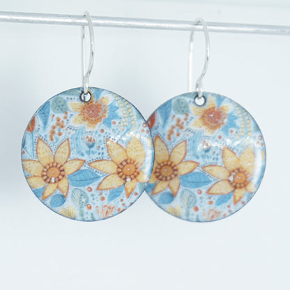Floral patterned earrings on a white background