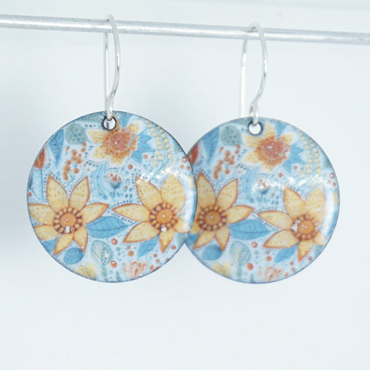 Floral patterned earrings on a white background