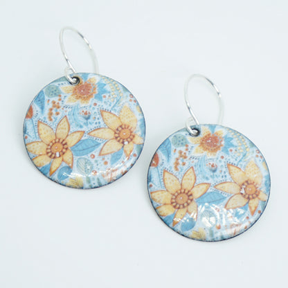 Floral patterned earrings on a white background