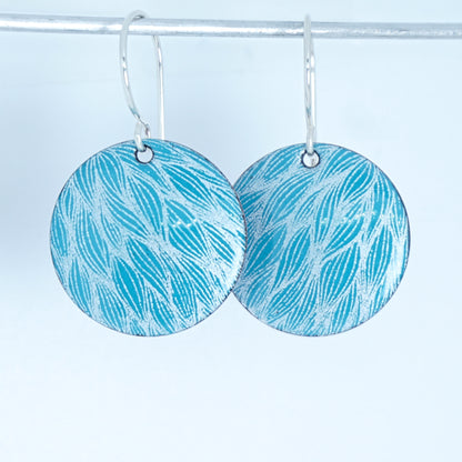 White Leaf Accents on Teal Green Enamel Disc Earrings