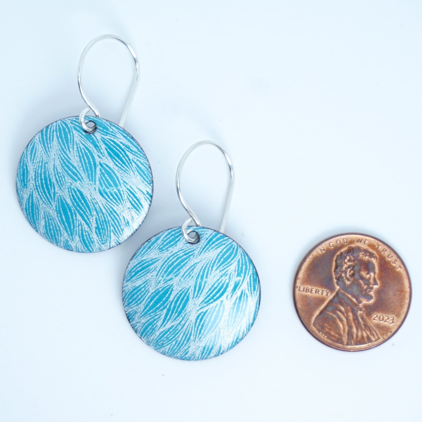 White Leaf Accents on Teal Green Enamel Disc Earrings